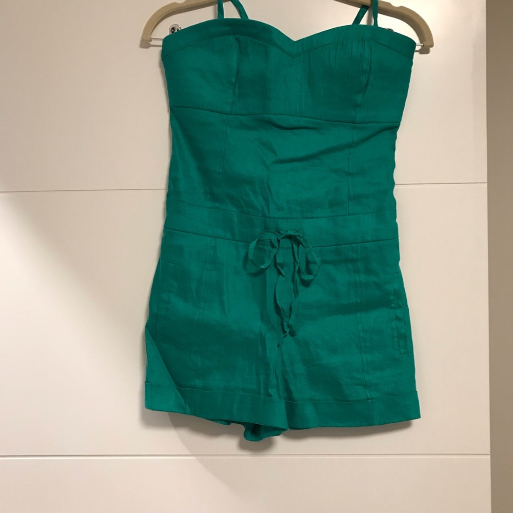 Green romper in XS from Bebe